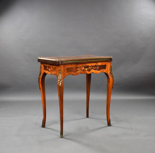 36 A Victorian Marquetry Writing Table CNXX
